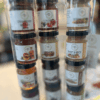 Mini jars of tapenade, jam, mustard in a gift tube